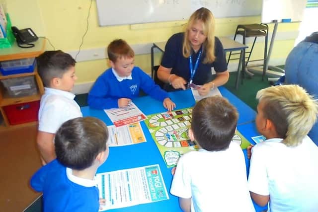 Children at Cayton Primary School in Scarborough having fun while learning about recycling.