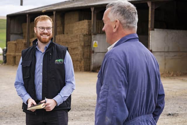 Jonathan Sandercock, NFU Energy Senior Project Engineer on farm conducting an on-site energy audit
