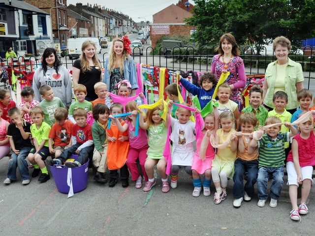 Gladstone Road Infant school held an arts week - pictured are some of the infants with their brightly coloured ribbons and staff back left to right Sophia Linley, Amber Persephone, Emily Pelucci, Mrs Leighton and Mrs Ward.
102465a