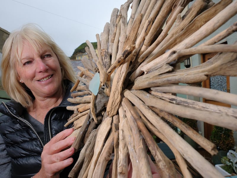 Anne Jervis with her wood sculptures in aid of the RNLI.
picture: Richard Ponter