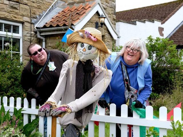 Enjoying the scarecrows.