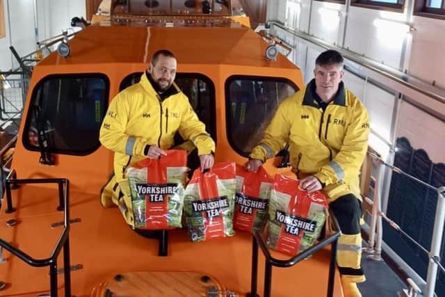 Brew crew. Volunteers with the donation. Photo: RNLI/AJ Shephard