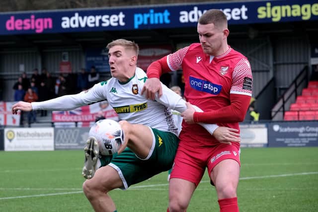 Boro defender Bailey Gooda gets to grips with a Gloucester City player during the hosts' 3-0 loss. PHOTOS BY RICHARD PONTER