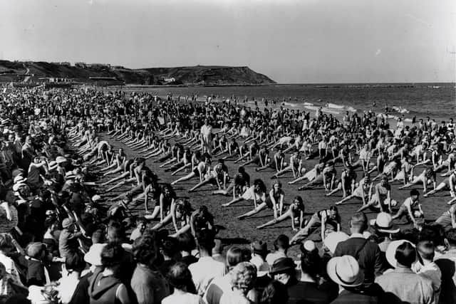 Keep fit and exercise classes for holidaymakers on the beach in Scarborough’s North Bay. (Pic credit: North Yorkshire Archives)