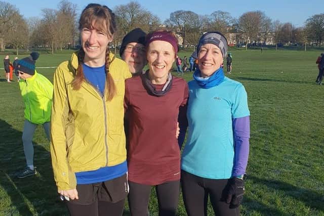 Sue Haslam, centre, celebrated his 70th birthday with Harrogate Parkrun age-group win, accompanied by her daughters.