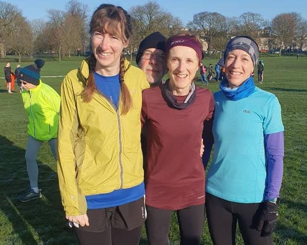 Sue Haslam, centre, celebrated his 70th birthday with Harrogate Parkrun age-group win, accompanied by her daughters.