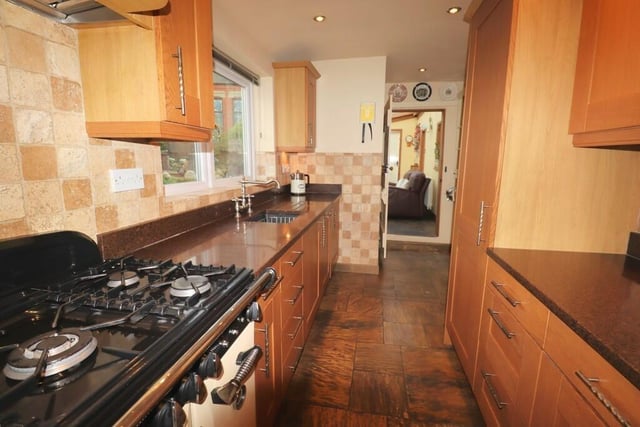 The kitchen, with fitted units,  includes some integrated appliances.