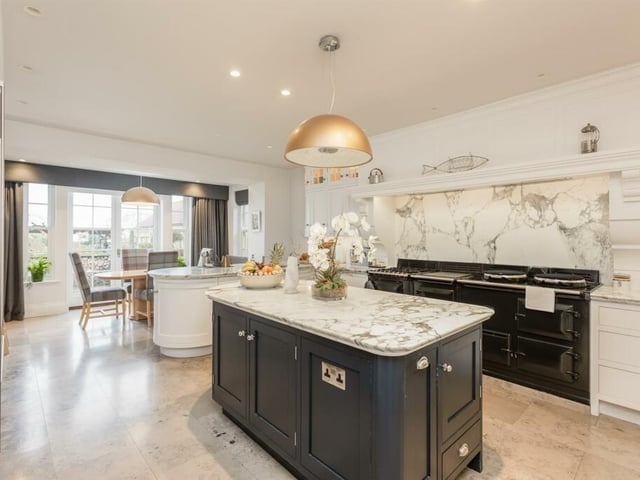 The extended kitchen with breakfast room is filled with high quality fixtures, fittings and appliances.
