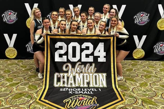 The East Coast Tigers celebrate winning the Senior Level 1 category at the All Star World Championships in Florida.