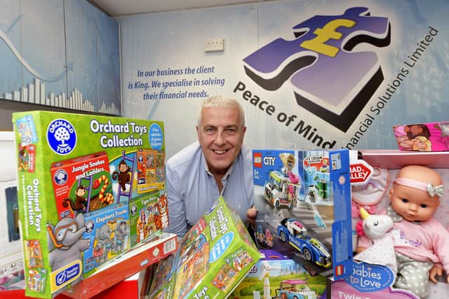 Christmas Toy Appeal Launch at Peace of Mind Financial Solutions with organiser Nigel Wood.