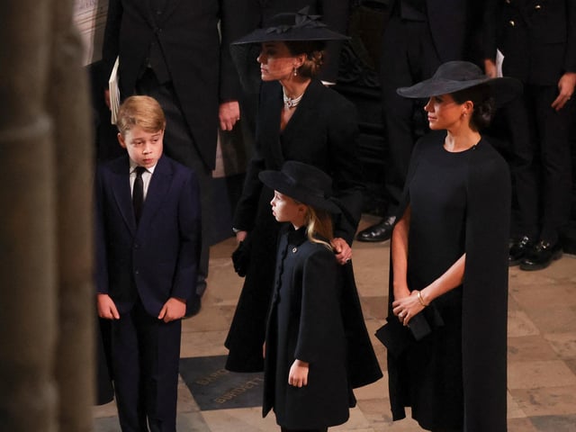 Prince George of Wales, Britain's Katharine, Duchess of Kent, Britain's Princess Charlotte of Wales and Meghan, Duchess of Sussex attend the state funeral and burial of Queen Elizabeth, at Westminster Abbey. (Photo by PHIL NOBLE / POOL / AFP) (Photo by PHIL NOBLE/POOL/AFP via Getty Images)