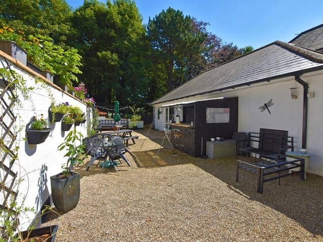 There is a paved entertaining area outside at the rear of the kitchen - perfect for barbeques