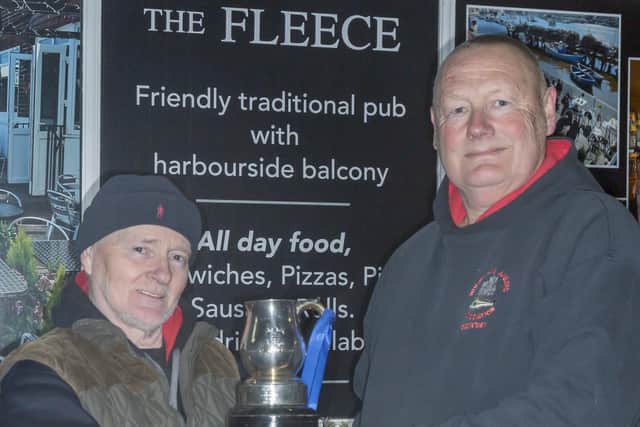 Brian Harland receives the Championship trophy from WSAA Secretary Peter Horbury.