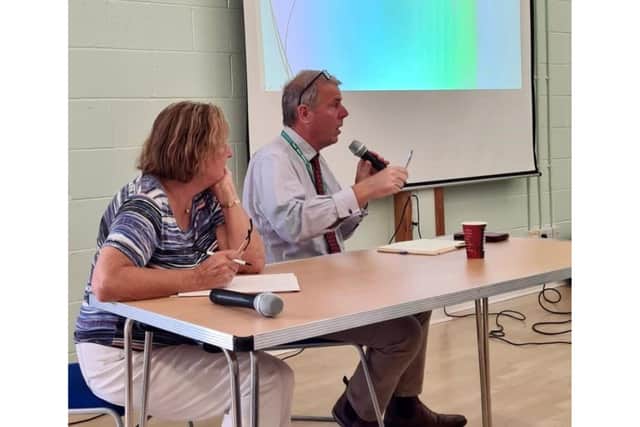 Councillor David Tucker answers questions at the North Library.