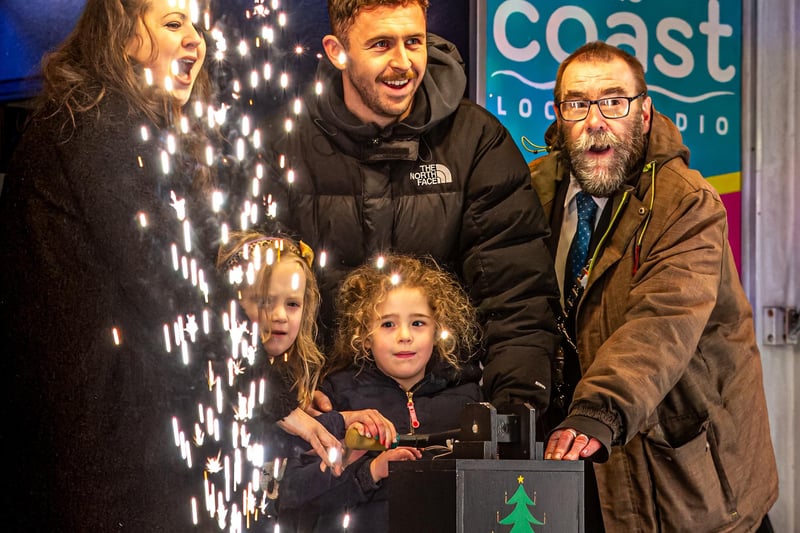 Switching on of Whitby's Christmas lights with Christmas card competition winner Judith Aconley, Whitby Town skipper Dan Rowe and Mayor Bob Dalrymple.