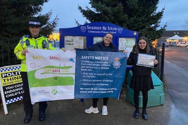 Seamer and Irton Primary School with winner Grace Fox, Police Community Support Officer Anna Wilkinson and North Yorkshire Council Community Safety Officer Anna Button.