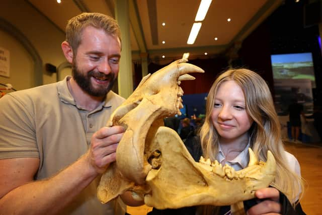 Flamingo Land's James Coleman with an Eskdale pupil at Scarborough Science Week 2023