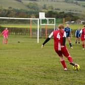 Player of the Match Isla delivers a free kick into the Wilberfoss area. Photo by Sarah Farrar.