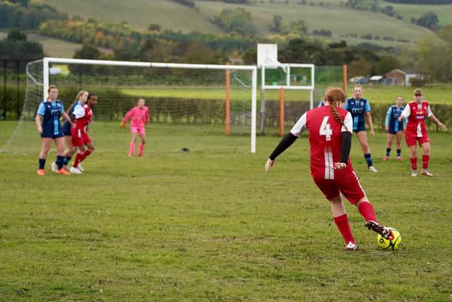 Player of the Match Isla delivers a free kick into the Wilberfoss area. Photo by Sarah Farrar.