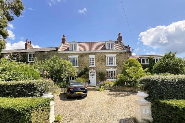 A front view of the handsome period home.