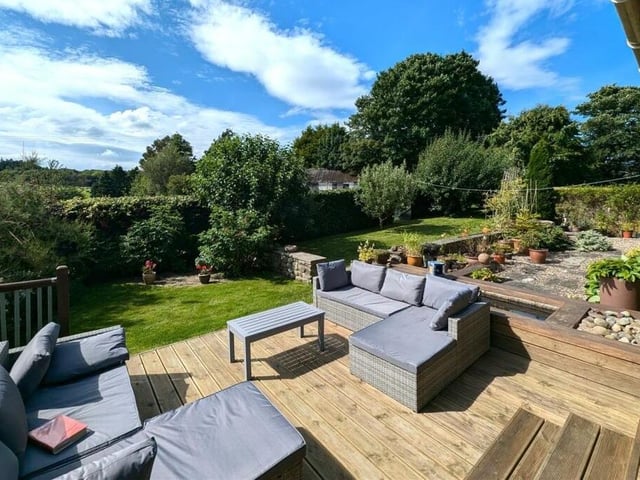 Attractive gardens are split in to manageable zones.