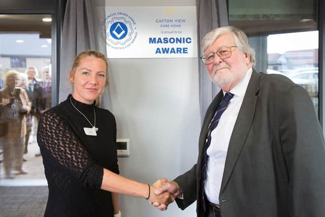 Cayton View Manager Leah Moon with Provincial Grand Master, Dr, David Chambers