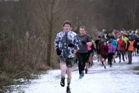 North Yorkshire Water Park parkrun winner Will Anderson leads the group. Photos by Richard Ponter