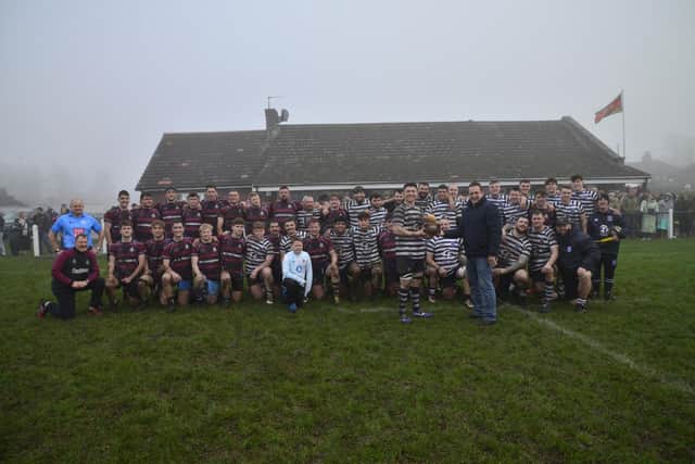 Club President Paul Rhodes hands over the Bottomley Trophy to Pocklington captain Will Sayer on Boxing Day. PHOTO ANDY NELSON.