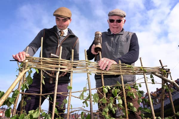 Chris Ford and Lol Hodgson working on the traditional Penny Hedge building in Whitby.picture: Richard Ponter
