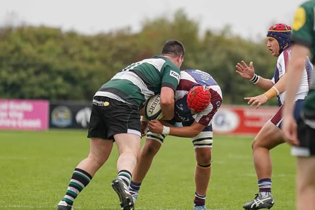 Debutant Rueben van Rensburg tackling for Scarborough against York. Photo by Charlie Hopper