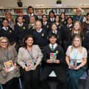 Staff and guests with pupils at the celebration. Picture: Richard Ponter