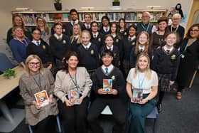 Staff and guests with pupils at the celebration. Picture: Richard Ponter