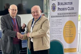 Outgoing Probus Club chairman Eric Butterworth hands over to Mike Gold, the chairman for 2025-2026.