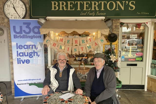 (L to R) Colin Lambert and his father Clifford Lambert outside local family business Breterton's, which they both frequent for a morning coffee and chat.