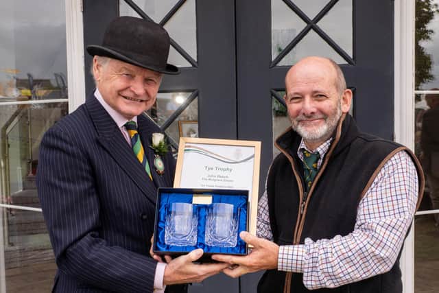 Simon Theakston, president of the Yorkshire Agricultural Society, presents John Beech, Mulgrave’s assistant rural surveyor, with a certificate and engraved crystal glasses at the Great Yorkshire Show.