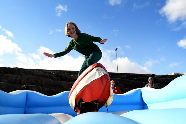 Martha Smith,10, from Scarborough has a go on the Surf Simulator.