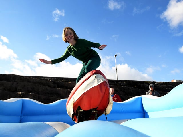Martha Smith,10, from Scarborough has a go on the Surf Simulator.