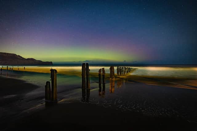 News street lights will go off at midnight, meaning better views of the night sky - the northern lights are pictured here at Sandsend. photo: Steve Bell.