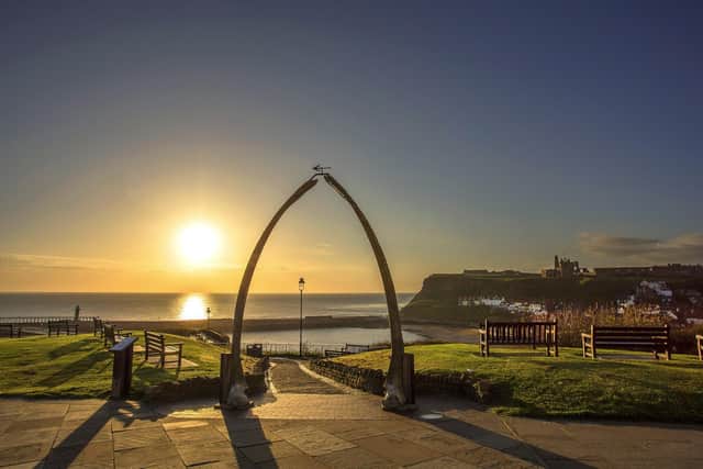 A beautiful sunrise over the North Yorkshire town of Whitby through the famous whale bones.