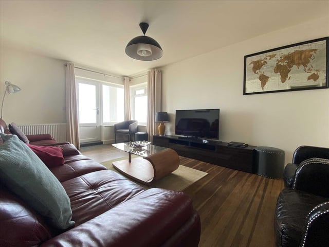 Another comfortable lounge, with access to the terrace and its stunning vista.