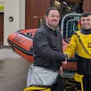 Adam Morland is congratulated after qualifying as a navigator. Photo: RNLI/Anna Needham