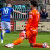 Brad Fewster races away to celebrate his opening goal in the 2-0 home win for the Blues against Atherton. PHOTOS BY BRIAN MURFIELD
