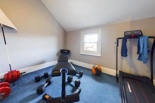 One bedroom is used currently as a home gym.