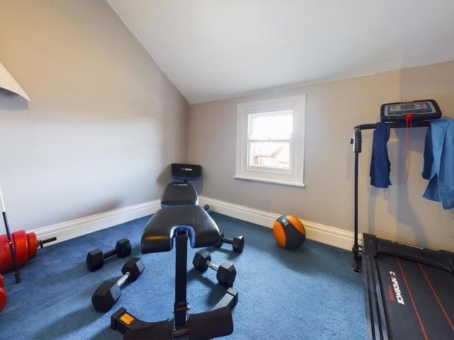 One bedroom is used currently as a home gym.