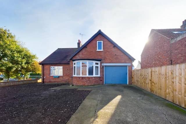 The bungalow has wrap-around gardens that are laid ready for turf.
