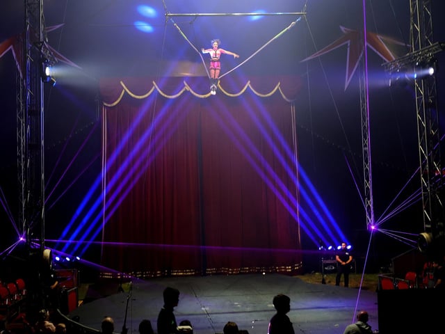 The big top was filled with an excited audience watching the spectacle.