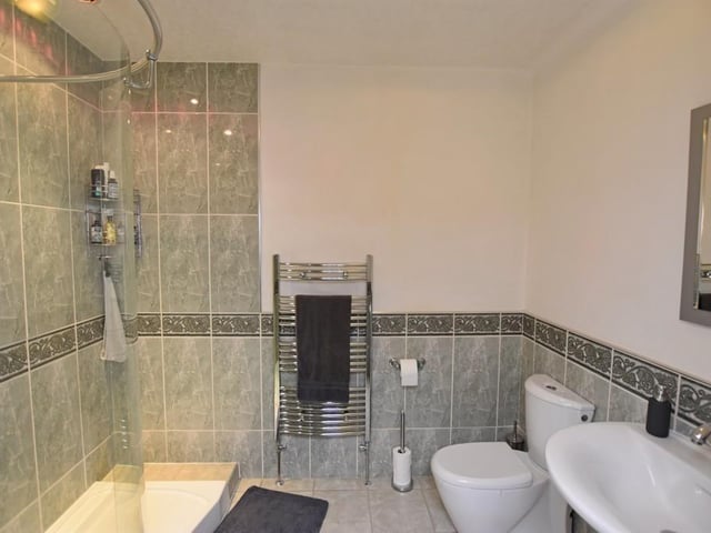 There is a spacious bathroom along with a WC and two en-suite bathrooms within the property