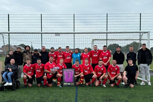 The Newlands team with the framed shirt of keeper Callum Myers, who sadly passed away last week, before their league game at Bridlington Spa.