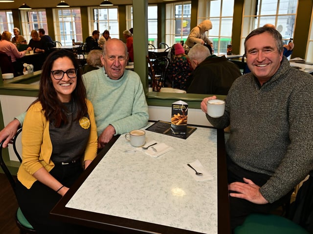 Product Customer Director Sara McInnes with customers Geoff Hart and Guy Smith