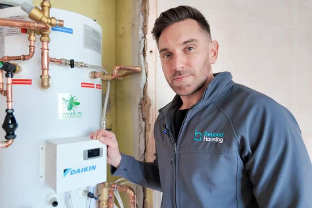 Beyond Housing Compliance Team Leader Jamie Whitaker pictured during the company's first heat pump installation.